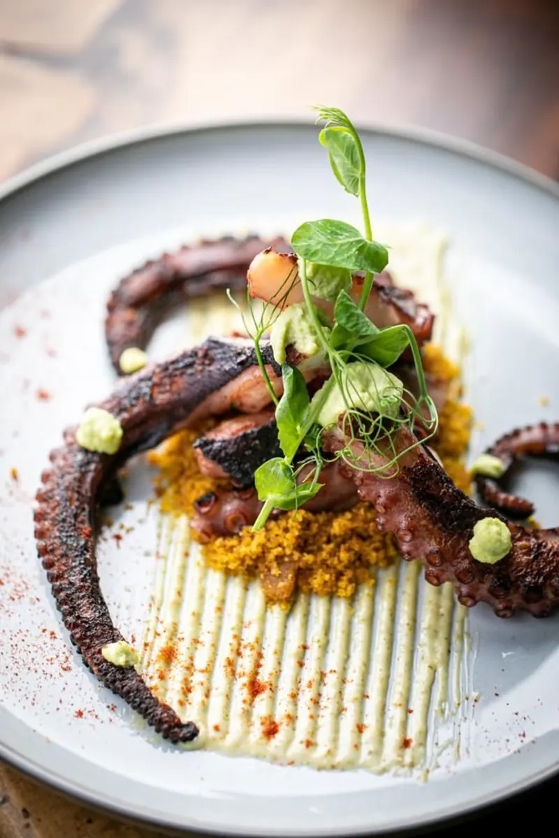 Robata-grilled octopus, a signature Asian-Latin fusion dish at Terrat Rooftop